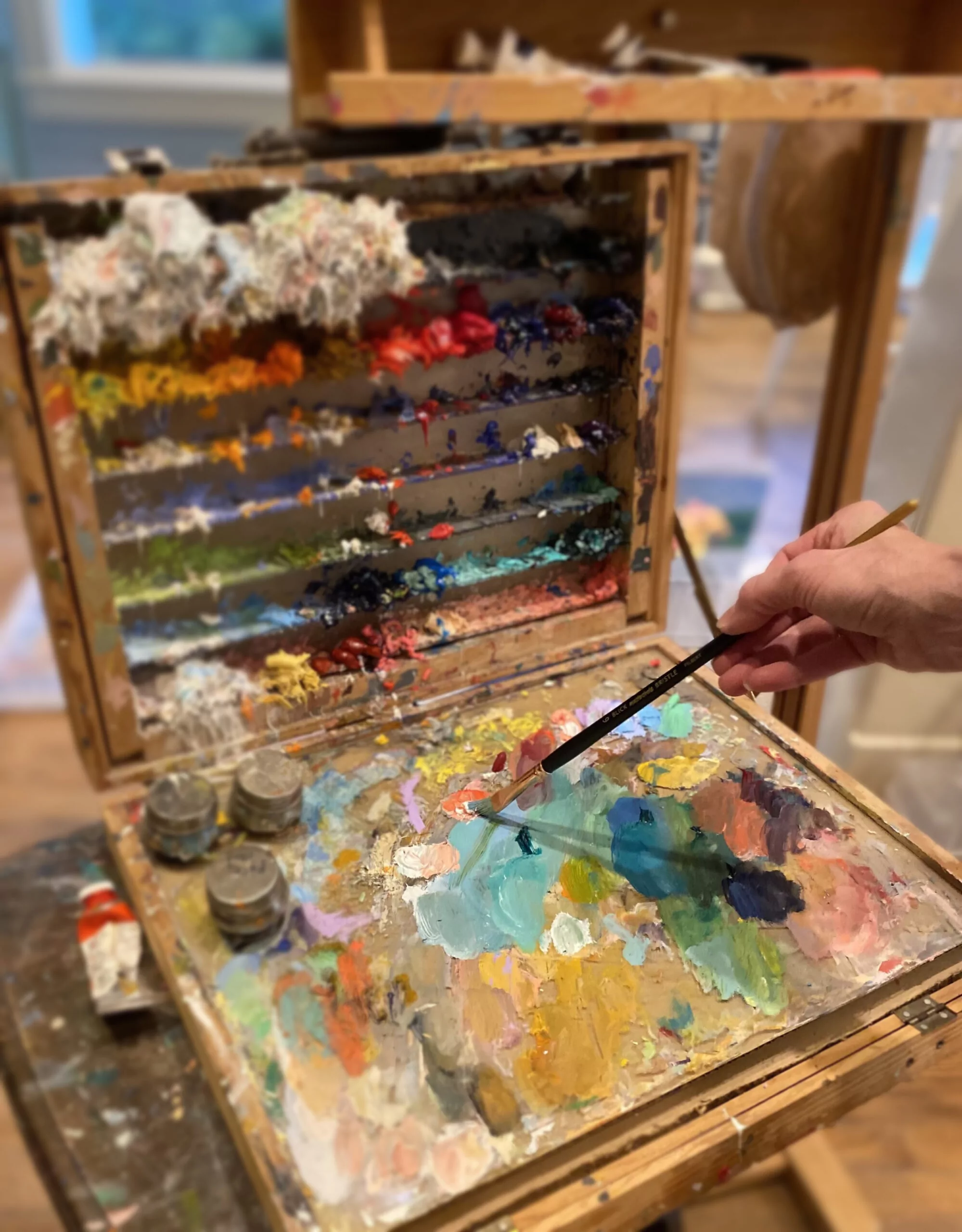 paint being mixed on an easel by Jennifer Anderson